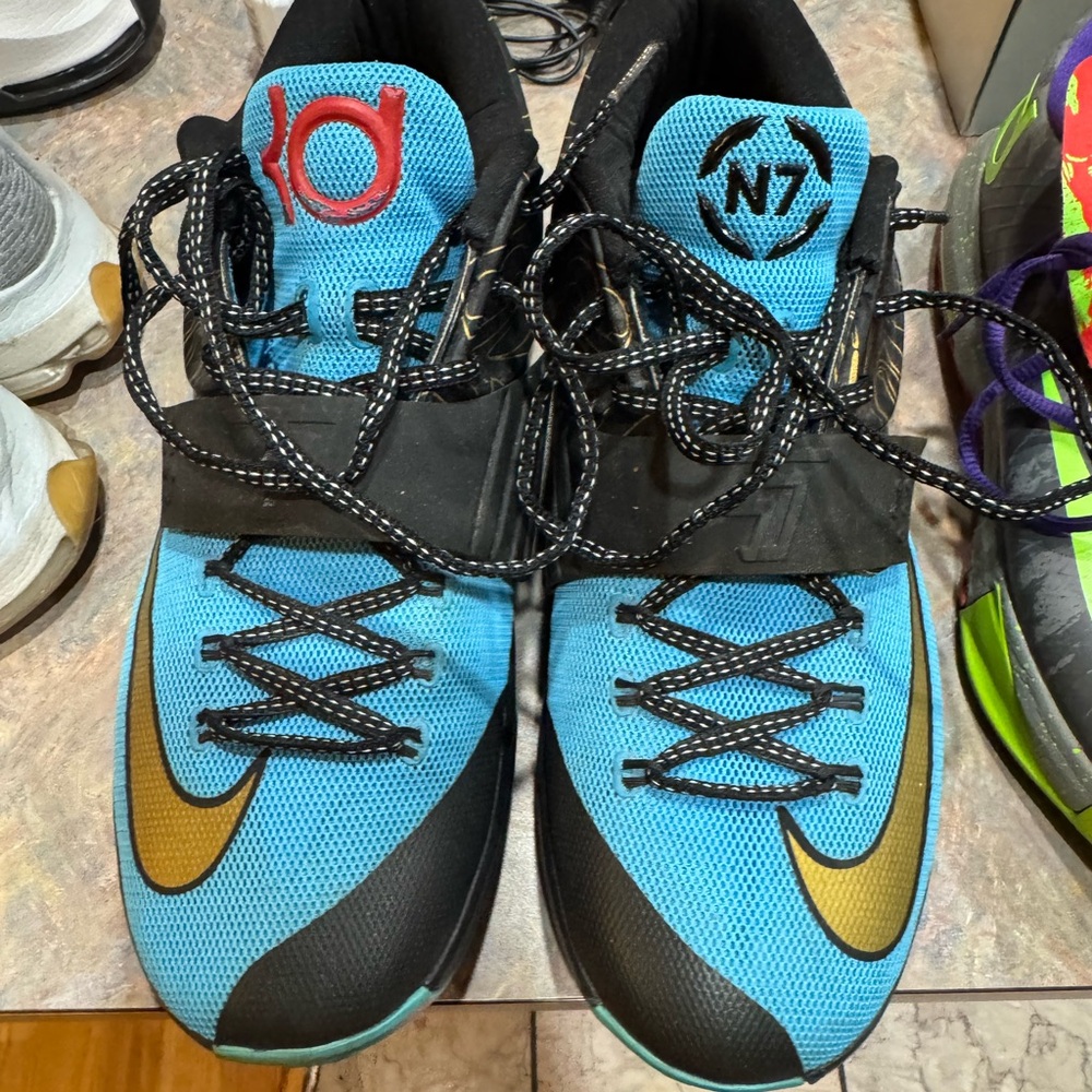 Nike Athletic Blue and Gold Basketball Shoes
